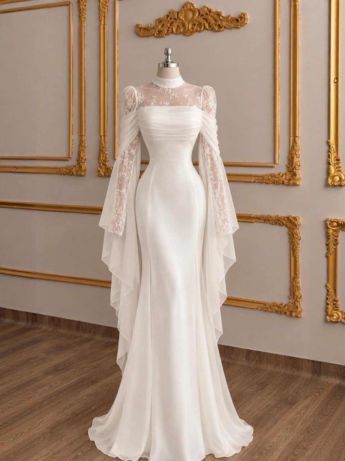Off-white satin bridal gown with lace bodice and flowing sleeves on a mannequin.